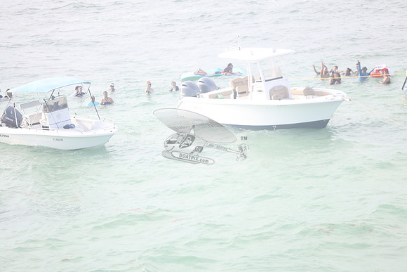 BOSTON WHALERS & PEO IN WATER.13