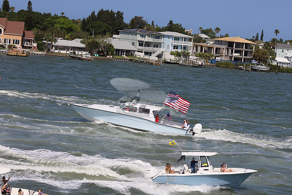 Cabin boat, 4 merc outboards.1
