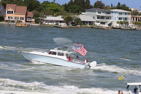 Cabin boat, 4 merc outboards.3
