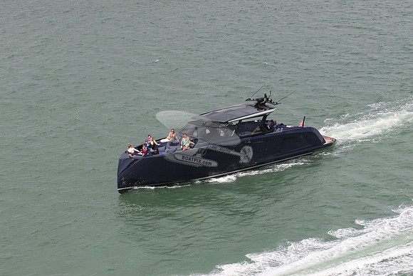big blue or black boat.10