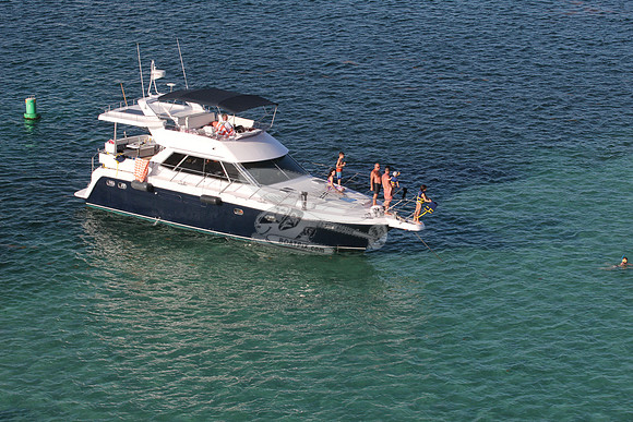 blue boat.white top.lots people.27