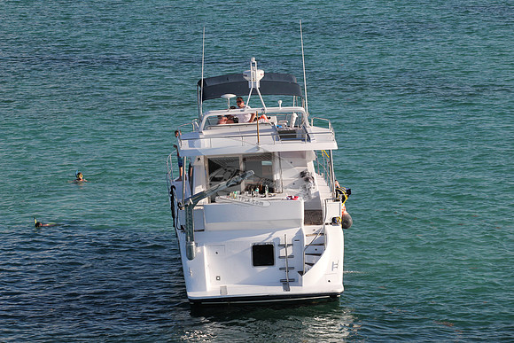 blue boat.white top.lots people.08