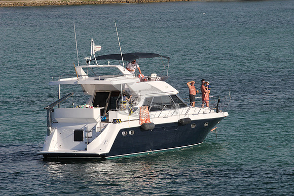 blue boat.white top.lots people.03