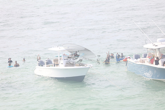 BOSTON WHALERS & PEO IN WATER.16