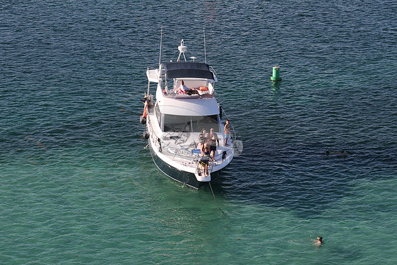 blue boat.white top.lots people.22