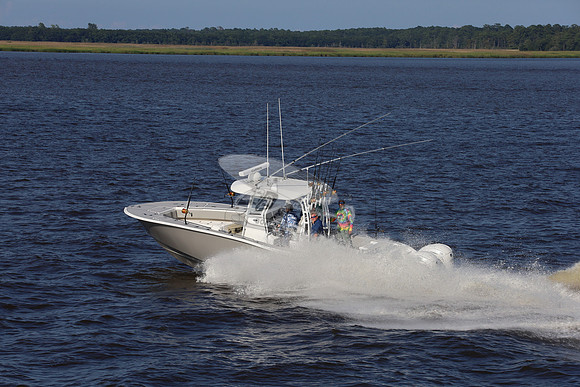 cape horn.tan hull.2 white yamaha.7287