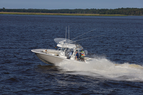 cape horn.tan hull.2 white yamaha.7288