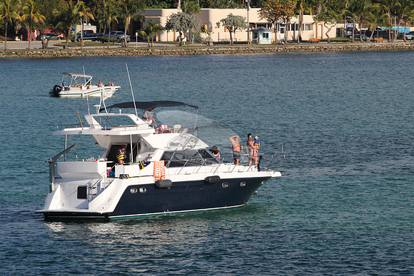 blue boat.white top.lots people.01