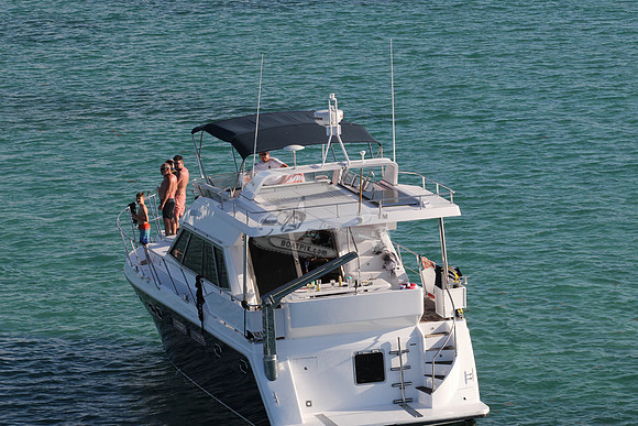 blue boat.white top.lots people.09