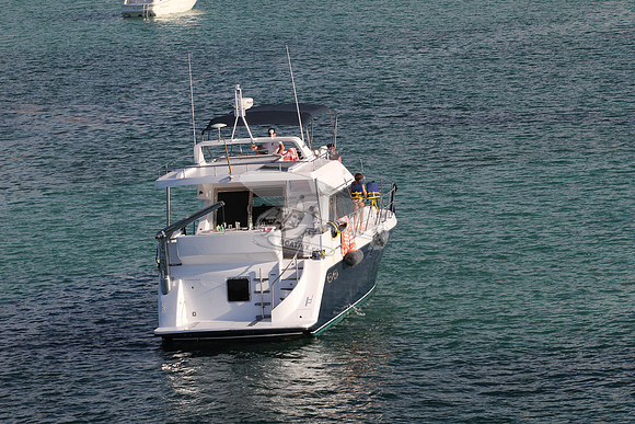 blue boat.white top.lots people.06