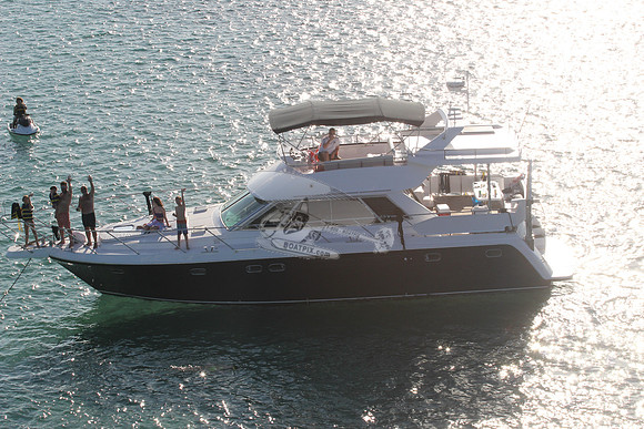 blue boat.white top.lots people.13