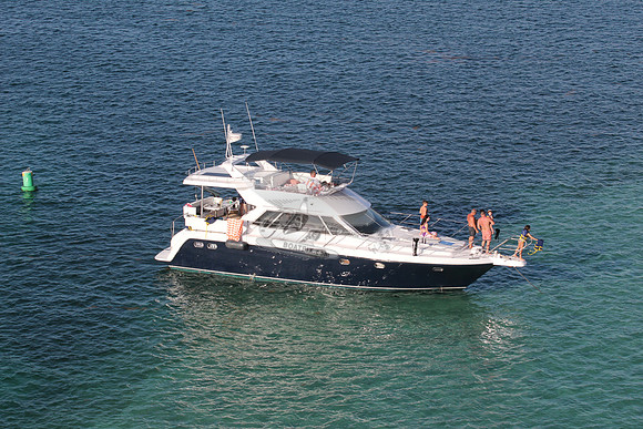 blue boat.white top.lots people.29