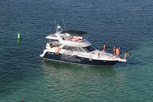 blue boat.white top.lots people.28