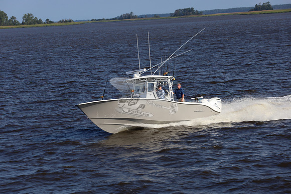 cape horn.tan hull.2 white yamaha.7300