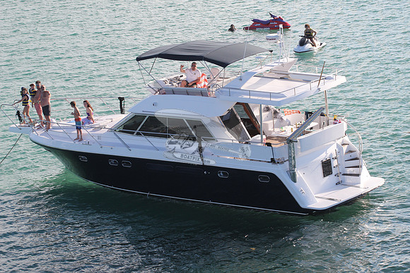 blue boat.white top.lots people.10