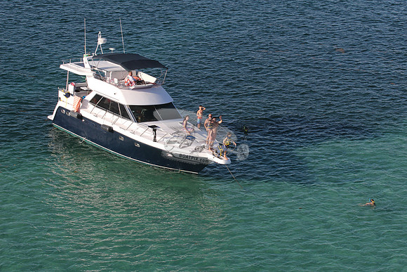 blue boat.white top.lots people.25