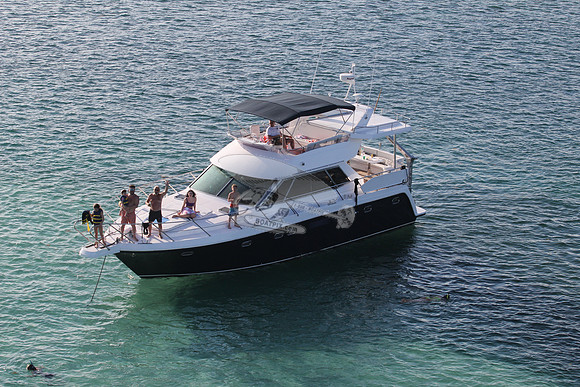 blue boat.white top.lots people.17