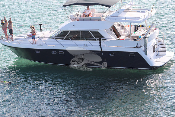 blue boat.white top.lots people.12